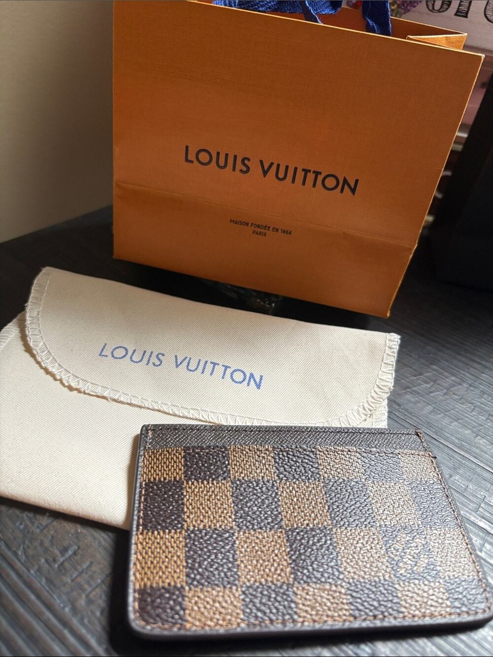 Louis Vuitton Damier Ebene card case holder with duster and bag